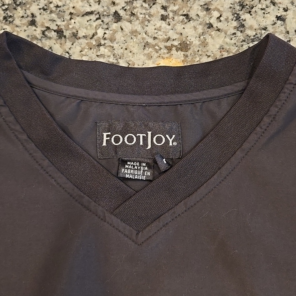 FOOTJOY WINDSHIRT SHORT SLEEVE  PULLOVER WITH SIDE POCKETS. BLACK. - Picture 7 of 10